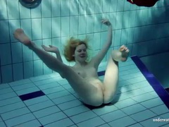 FuckCult presents: Blonde goes for a swim and strips
