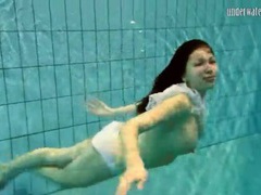 FuckCult presents: Girl in white panties swims in pool