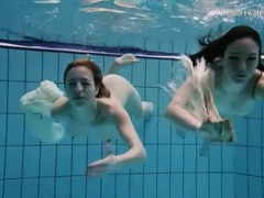 FuckCult presents: Nearly naked girls go swimming in the pool