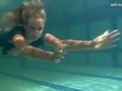 FuckCult presents: Big tits blonde girl swims in the nude