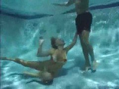 FuckCult presents: She has a threesome underwater