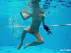 FuckCult presents: Teen strips off her dress as she goes for a swim