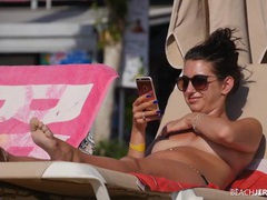 FuckCult presents: Topless amateur relaxes on a lounge chair